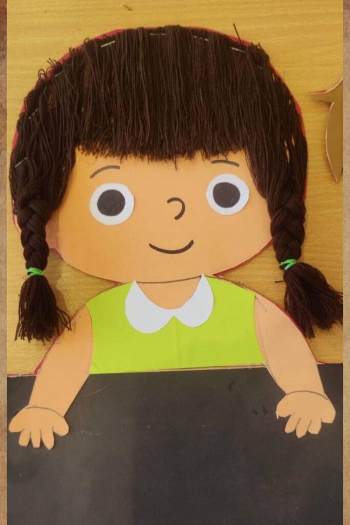 Handmade Cartoon Girl With Craft Paper